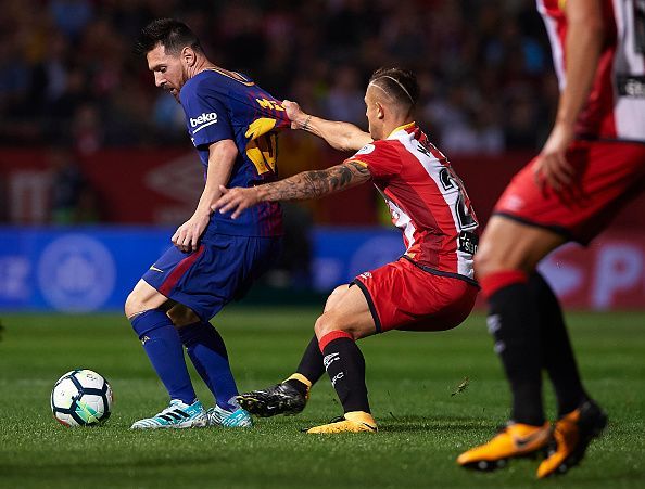 Man marking Messi, winning the battle while losing the war