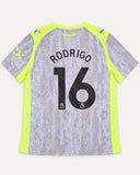 Back of Manchester City 2025-26 third kit with Rodrigo name and number, vintage football shirt, size XL, flat lay