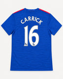 Back of Manchester United 2016-17 away kit with Michael Carrick name and number, vintage football shirt, size L, flat lay