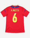 Back of Spain 2012-13 home kit with Andres Iniesta name and number, vintage football shirt, size M, flat lay
