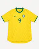 Front of Brazil 2000-01 home kit, yellow Nike shirt with green trim, Ronaldo Nazario vintage football shirt, size M, flat lay