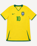 Front of Brazil 2008-09 home kit, yellow Nike shirt with green trim, Ronaldinho vintage football shirt, size L, flat lay