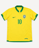 Front of Brazil 2006-07 home kit, yellow Nike shirt with green trim, Ronaldinho vintage football shirt, size XL, flat lay