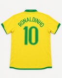 Back of Brazil 2006-07 home kit with Ronaldinho name and number, vintage football shirt, size XL, flat lay
