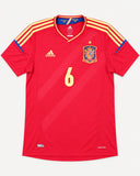 Front of Spain 2012-13 home kit, red adidas shirt with gold trim, Andres Iniesta vintage football shirt, size M, flat lay