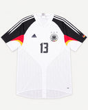 Front of Germany 2004-05 home kit, white adidas shirt with black, red and gold trim, Michael Ballack vintage football shirt, size XL, flat lay